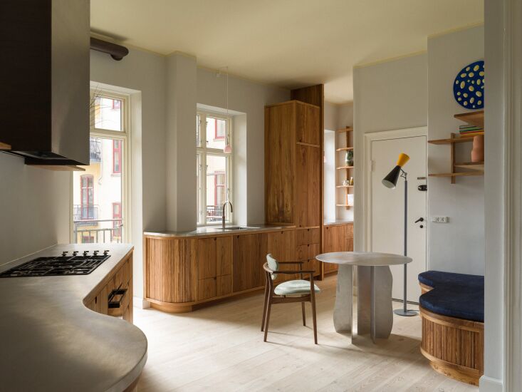 the pendant light is from anders raad glass. the custom kitchen bench is uphols 17