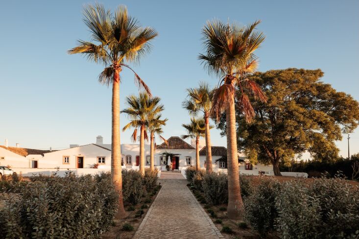 the central farmhouse and surrounding structures have been transformed into fiv 17