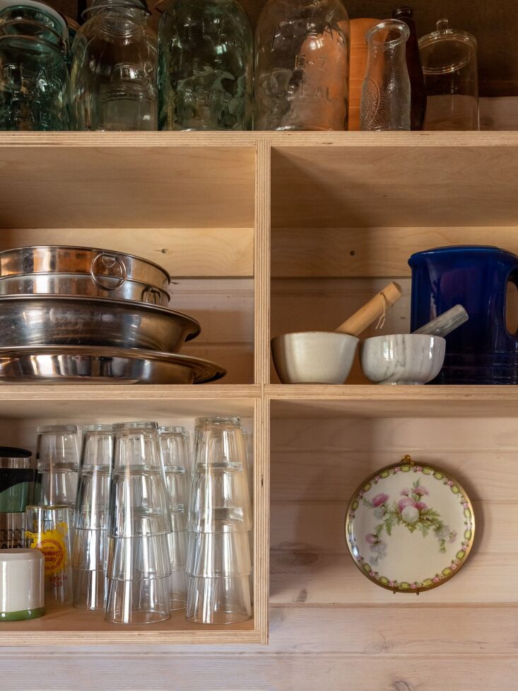 modern wall hung storage shelving in the kitchen. 23