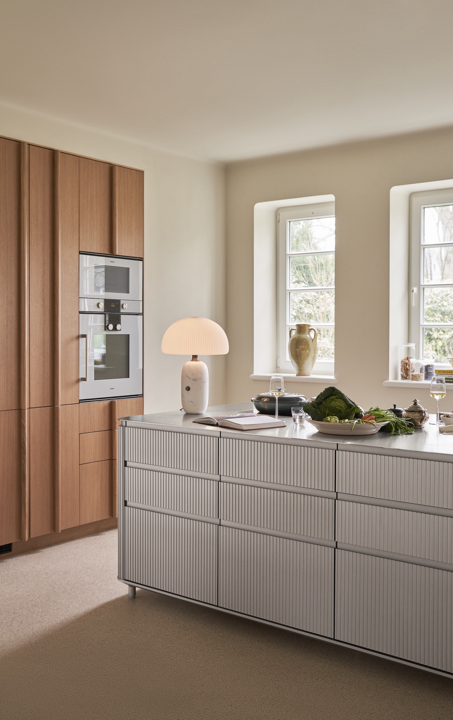 the wall of built ins, which includes the fridge and gaggenau wall oven, are fr 20