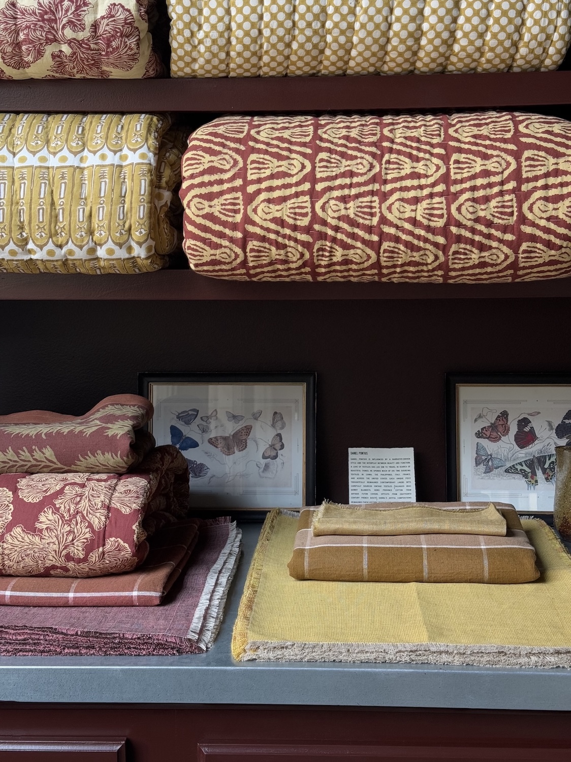 studio ford quilts, block printed and hand sewn in rajasthan, are displayed wit 24