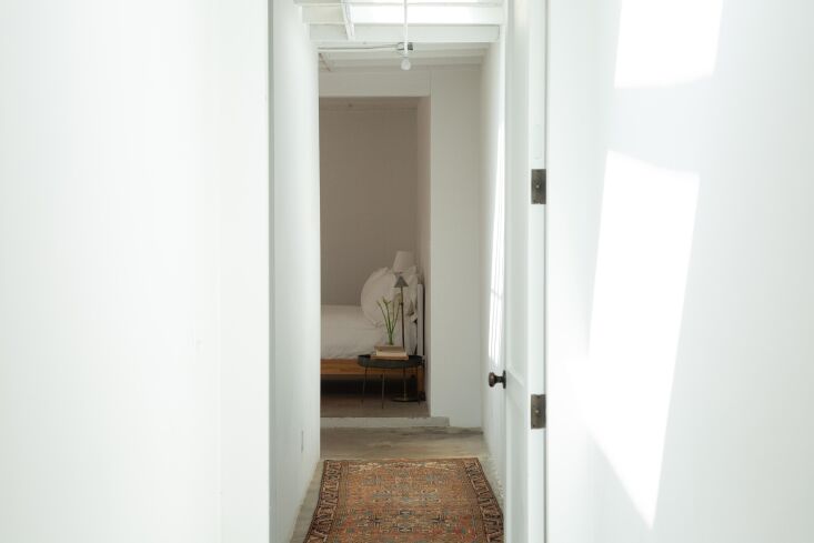 the view to the main bedroom. the small home has just two bedrooms and two bath 25