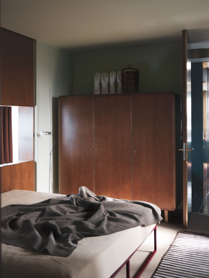 a monumental size armoire from dimoremilano and tito agnoli floor lamp. 27