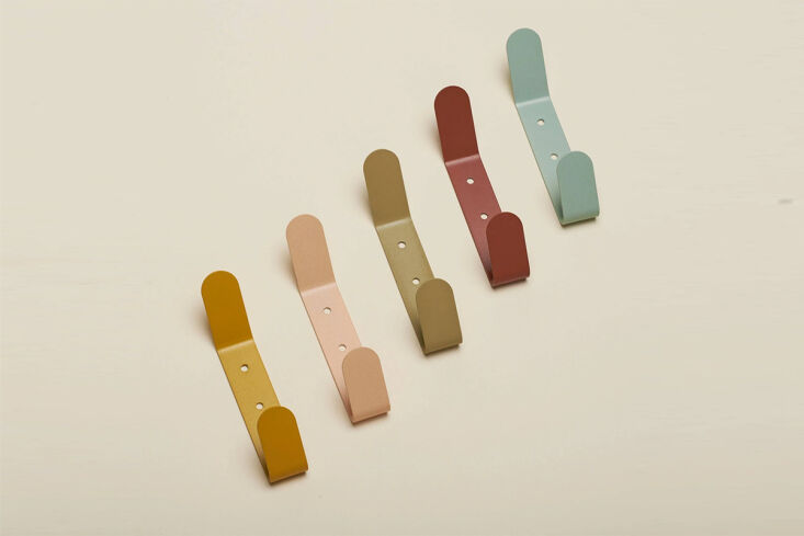 the sturdy yet slim double hook helps keep coats, hats, and totes off the floor 18