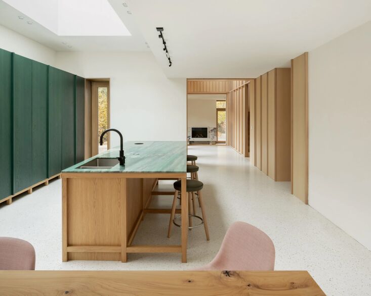 a berlin kitchen with forest green linseed stained cabinets complement the gree 19