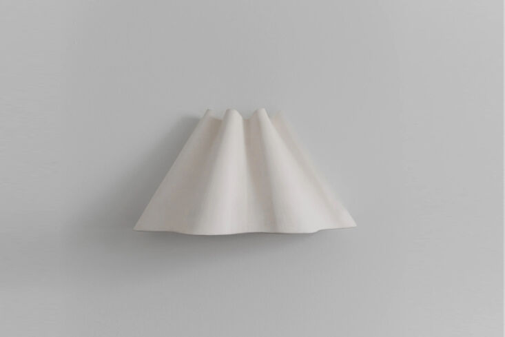 the porcelain margaux sconce evokes &#8\2\20;lived in sheets and draped cur 17
