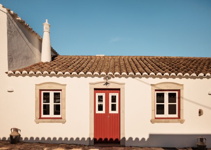 flower house is set on an alley paved in old cobblestones and has its own cover 23