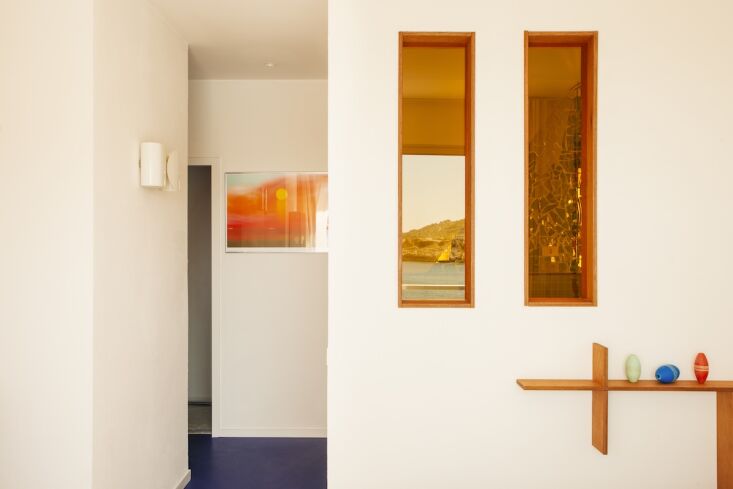 interior windows offer a glimpse of the sea and of the bathroom&#8\2\17;s m 24