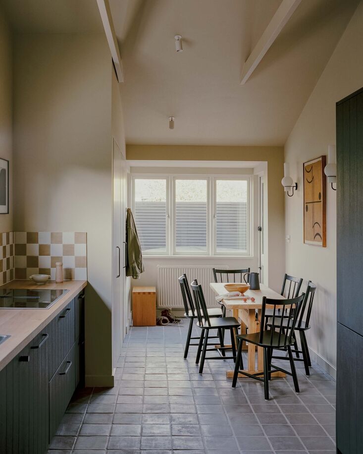 the dining table is surrounded by hay\2\17;s reproduction of the black j 18