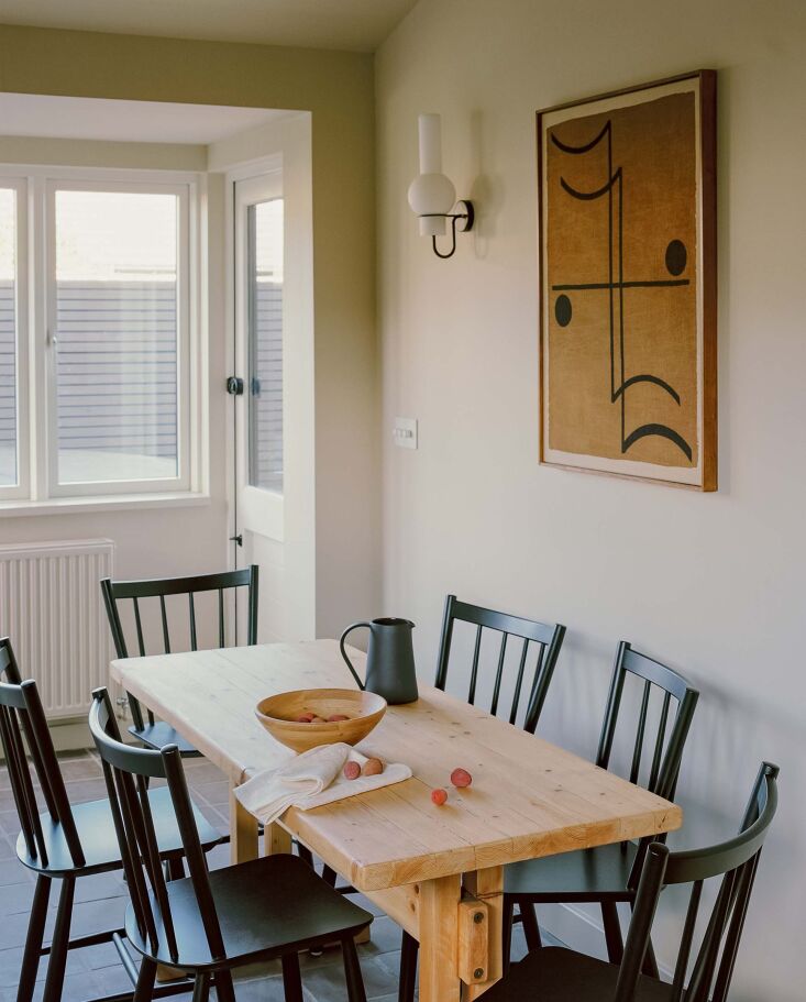 on the table sits another country\2\17;s black pitcher. the sconces are 19