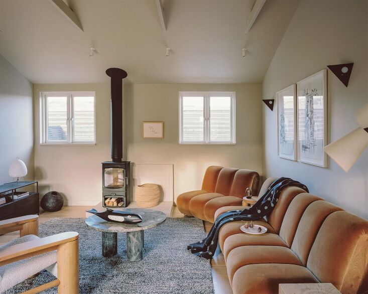 the \1,700 square foot house includes a homey living space, designed with the n 20