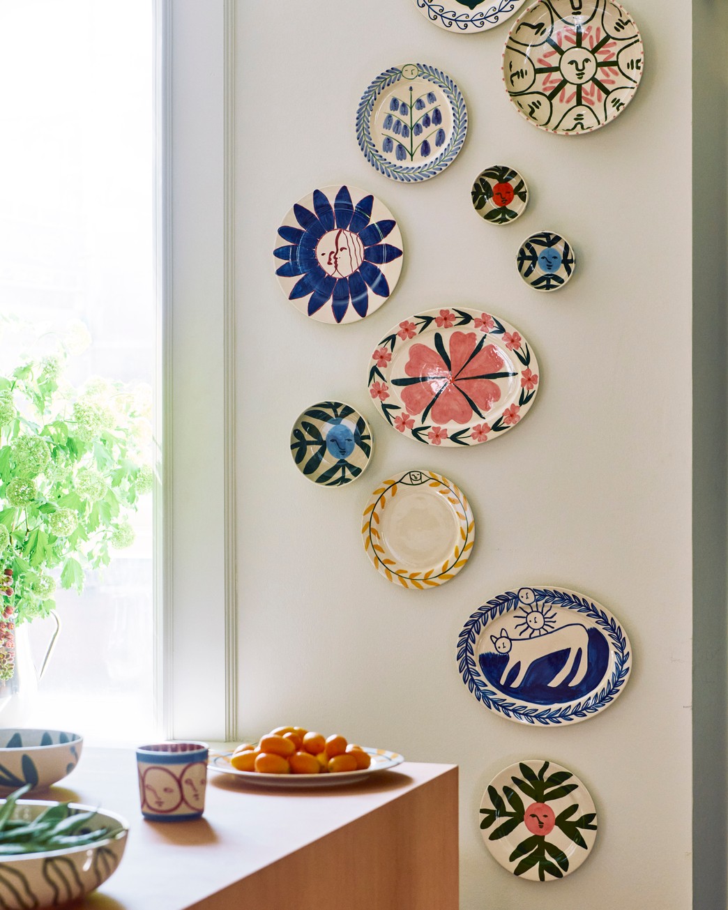 on display at hay house: the cat platter is the charlotte; \$95.&#8\2\2\1;v 24