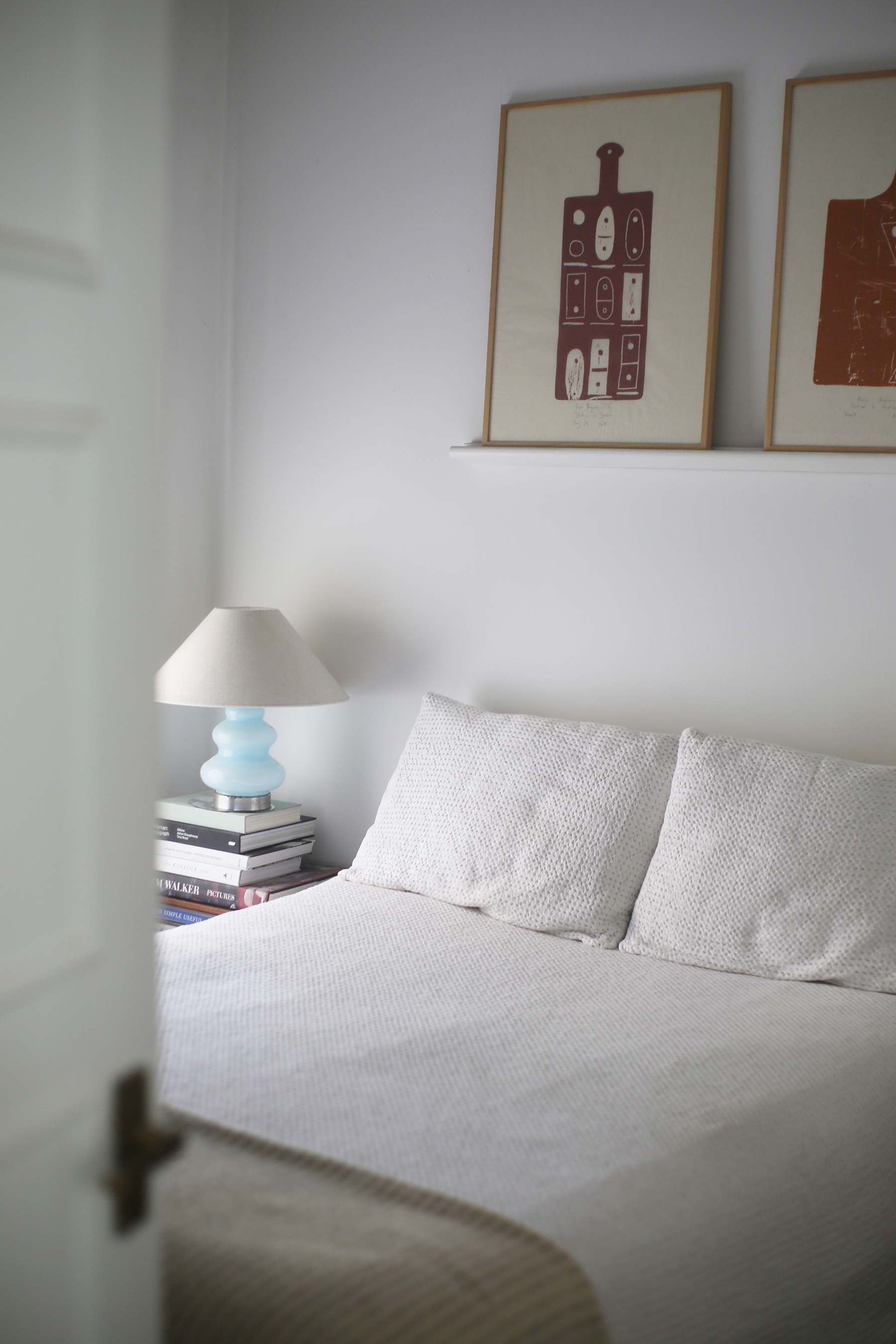 there are two bedrooms, both situated in the front of the apartment. this one h 29