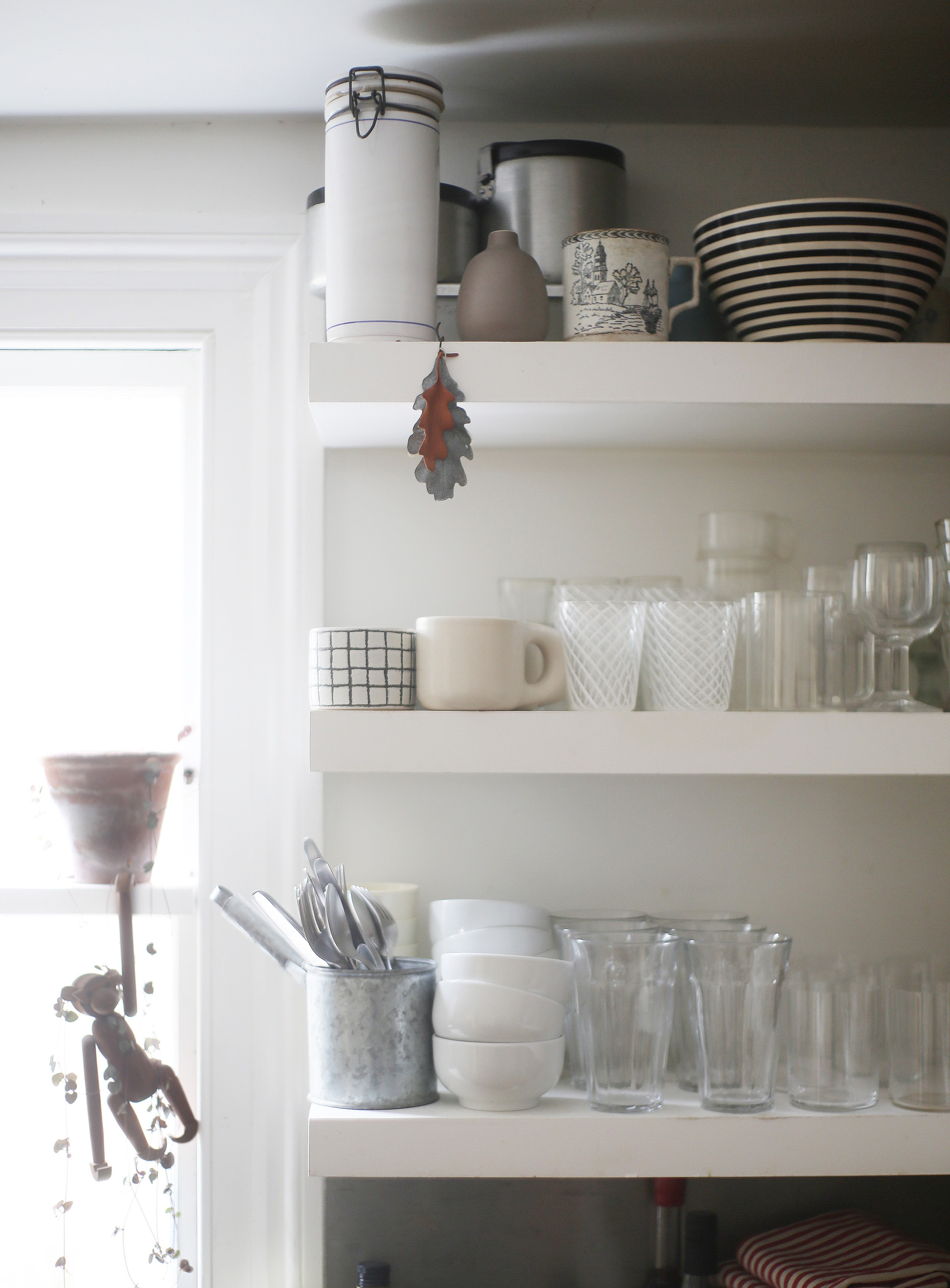 open shelving near the cooker may not appeal to all, but sandy is a proponent:  21