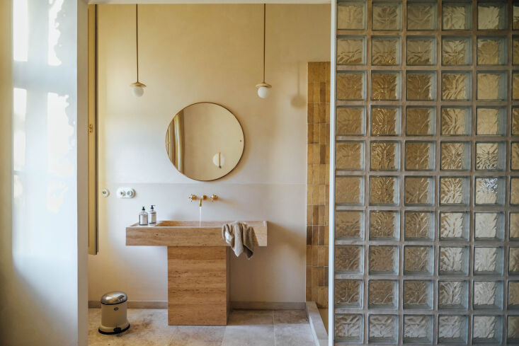 one of two bathrooms makes the case that glass blocks are making a comeback. 28