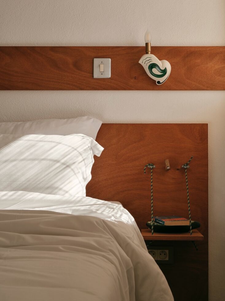 a look at the clever nightstand: it&#8\2\17;s suspended from thin ropes so  17