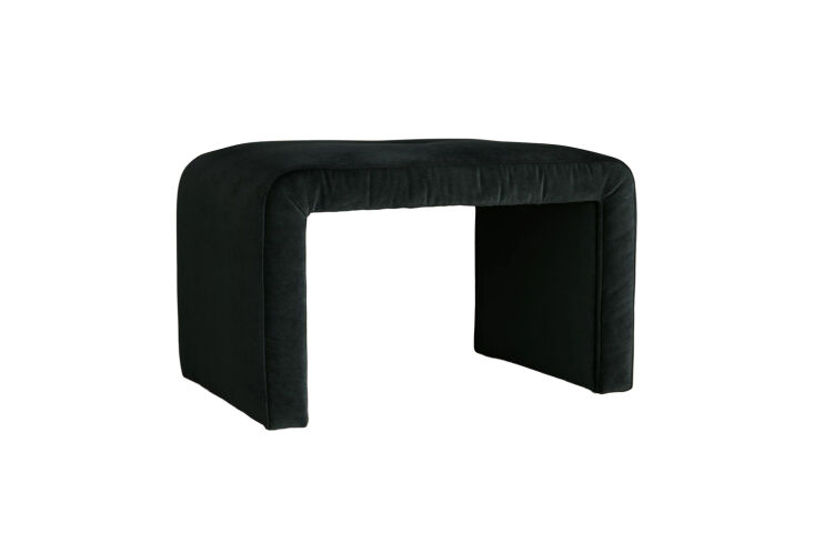 at the foot of the bed is a pair of ryan ottomans, available in a wide range of 26