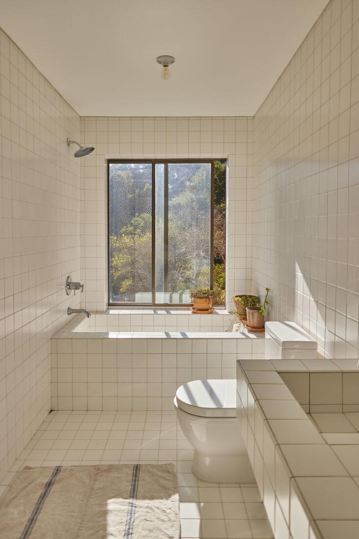 \2\20;i designed the bathrooms as a counterpart to the predominantly woo 26