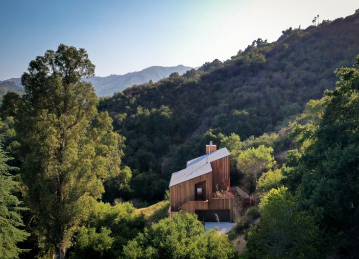 tucked into the hills of topanga canyon, the house feels remote but is \ 32