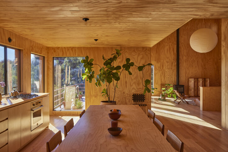 the kitchen now features a lowered ceiling to set the room apart from other liv 21