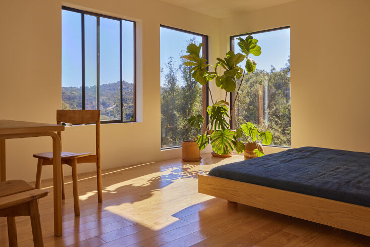 the bed frames are all designed by beatrice who had them made by her carpenter. 25