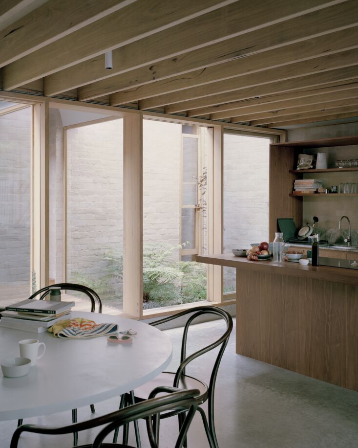 floor to ceiling windows on this end of the extension look out onto an inner ga 26