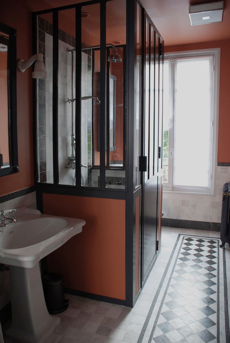parisian designer marianne evennou reworked an apartment bathroom in a shade re 27