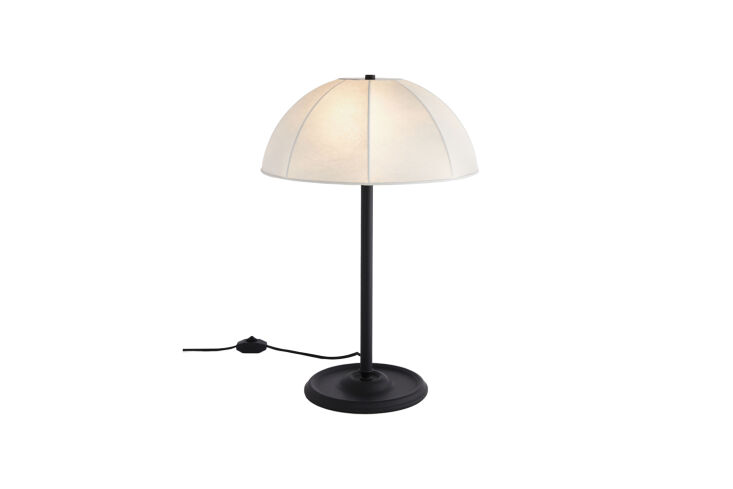 each bedside table is topped with a montello table lamp in oil rubbed bronze; \ 30