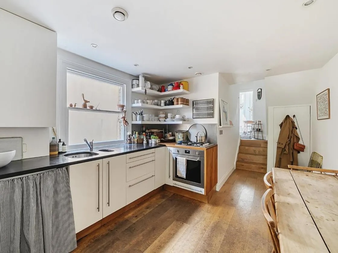 sandy installed an l shaped kitchen with a honed slate counter, franke sinks, a 19