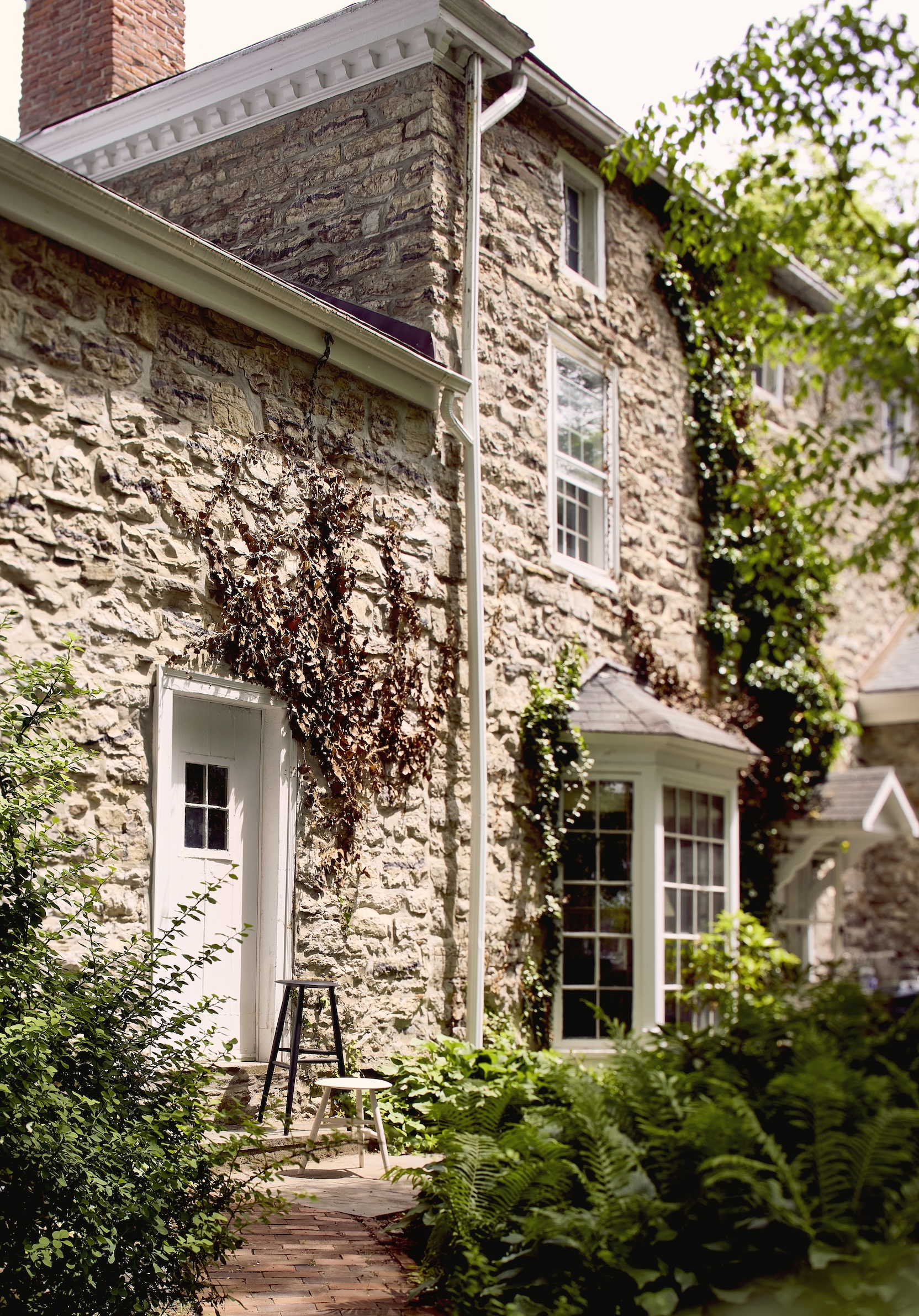 the compact two story house shares a backyard with the adjoining dwelling—som 18