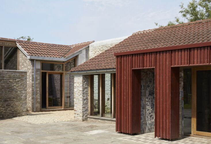 parts of the \1980s extension were taken down to reveal the historic stone wall 27