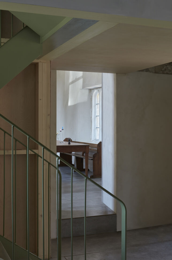 a new green metal central stair leads to the bedrooms. 22