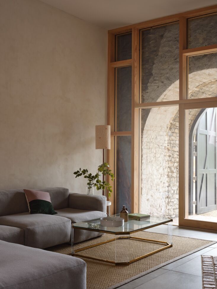 a wood framed glazed entrance leads to the back lounge. photograph by simon bev 28