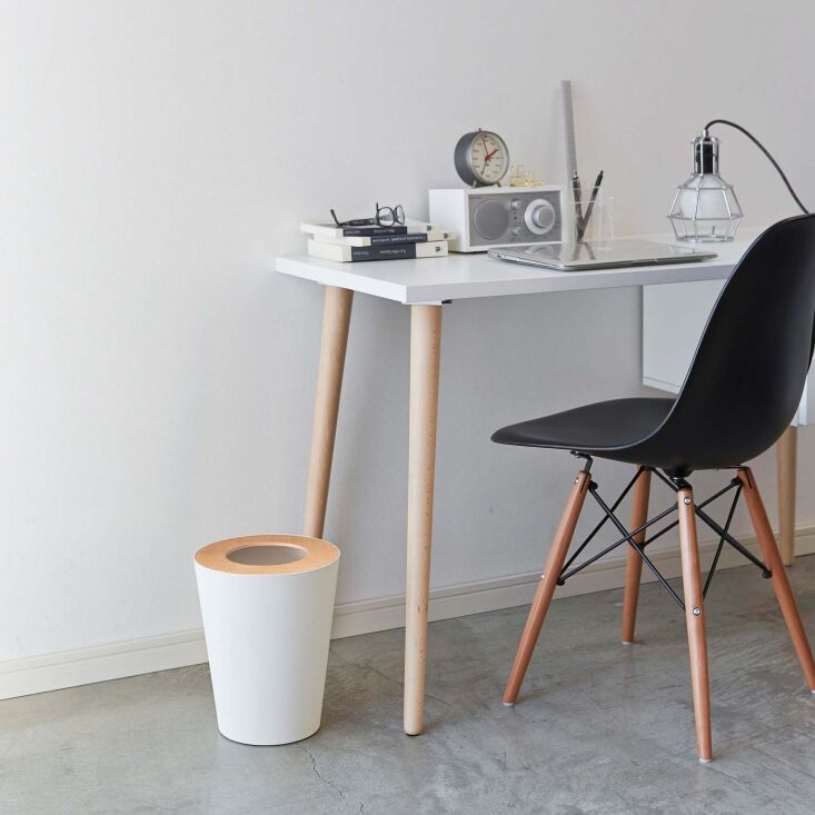 from japanese co. yamazaki, the round rim trash can has a steel body and walnut 20