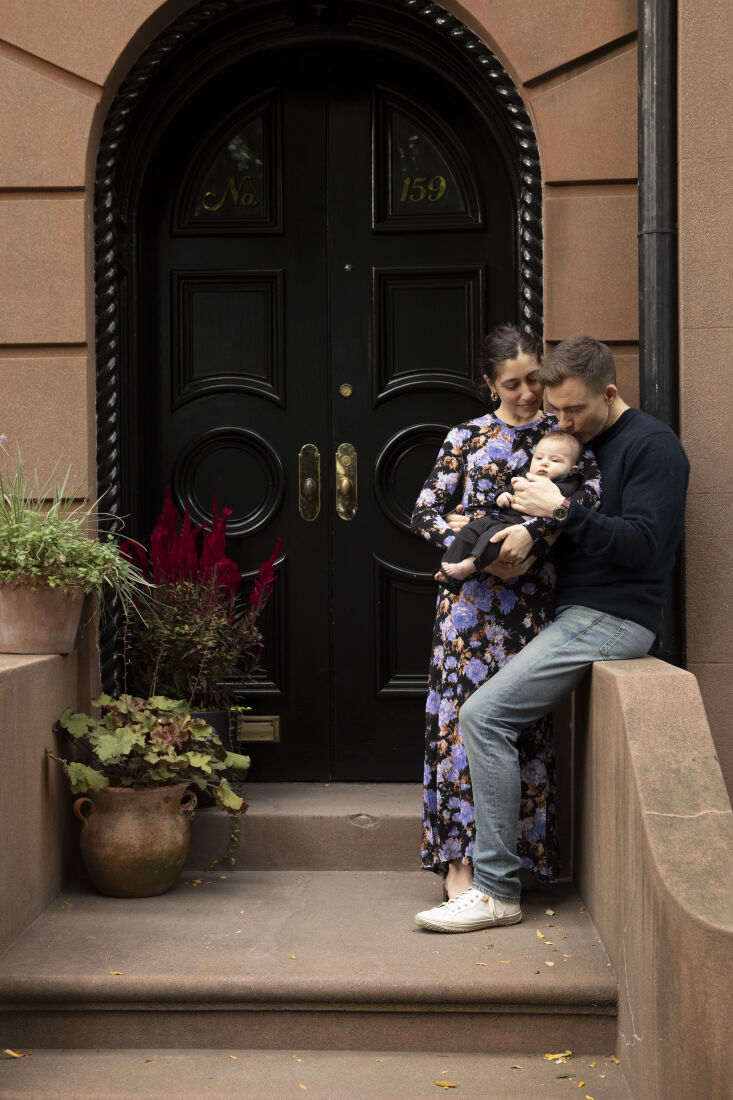 lauren and her husband with their baby girl. 33