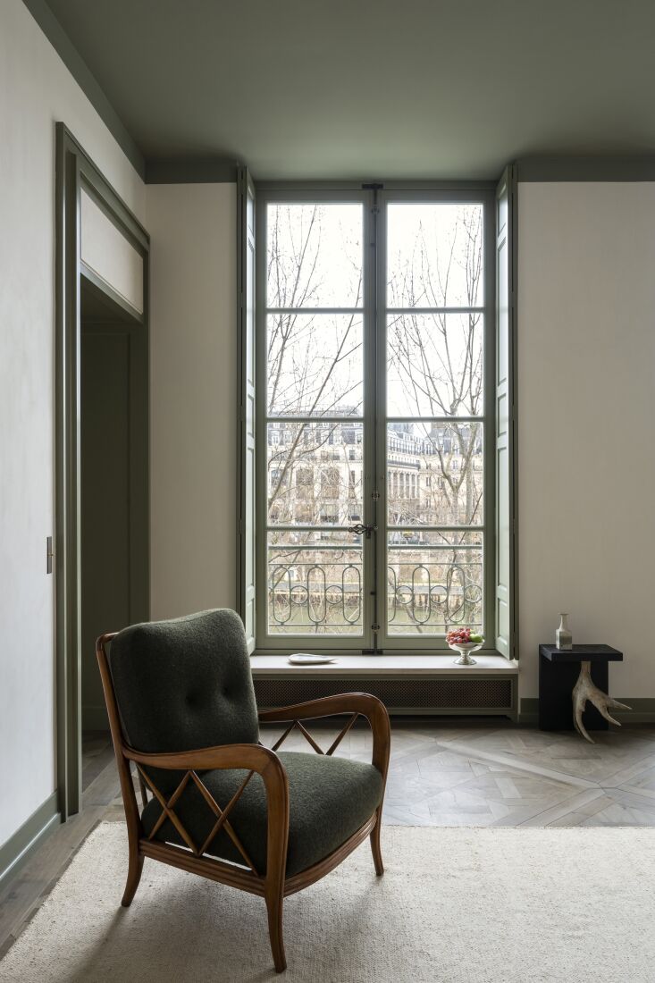 another view of the living room reveals a rick owens stag t stool. 27