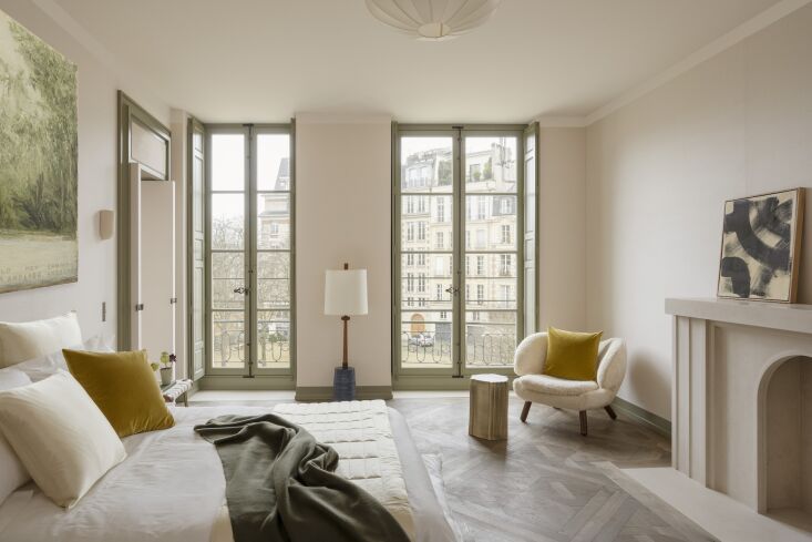 windows flank a \1960s gordon & jane martz floor lamp. 19