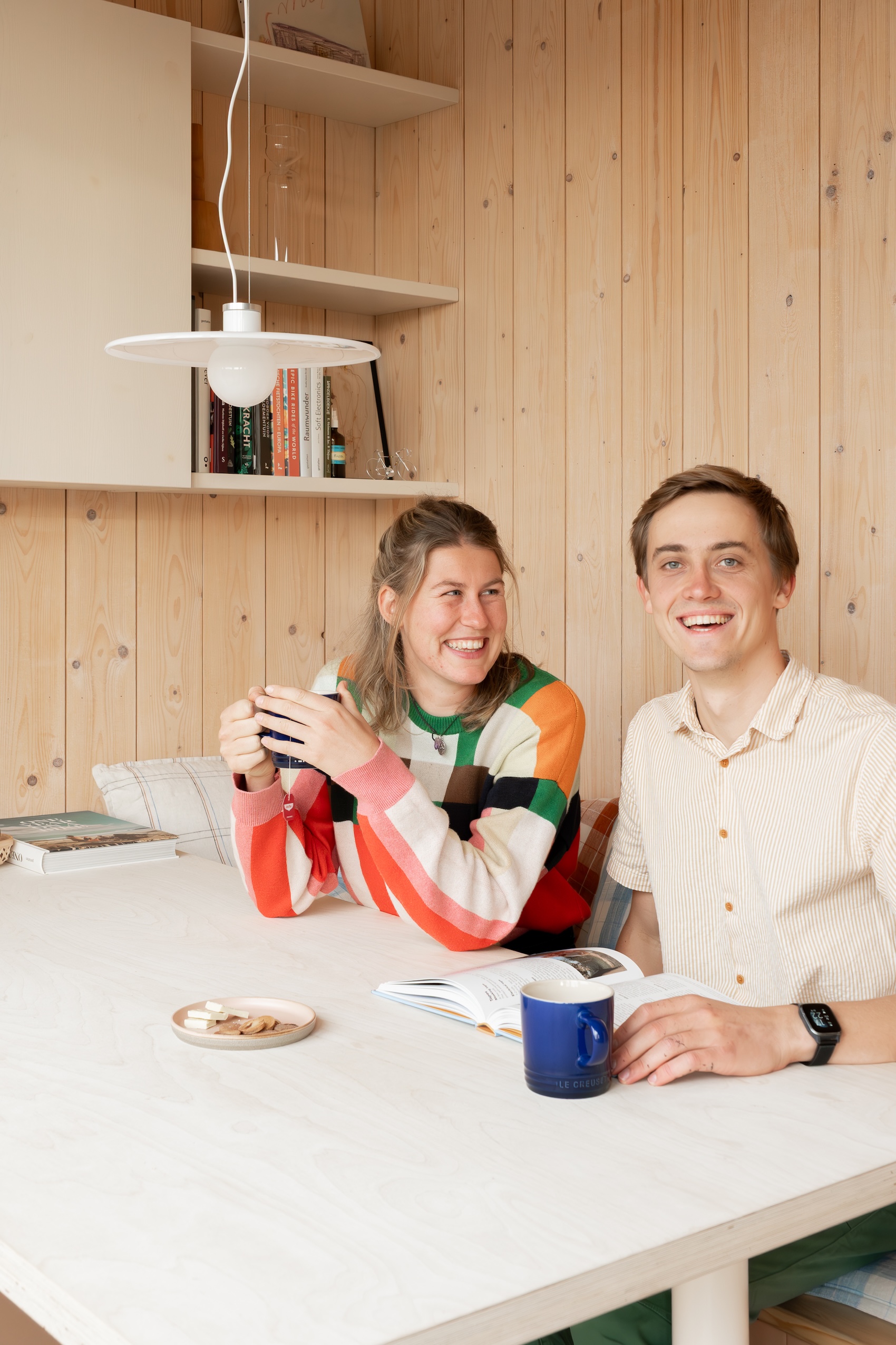 a selfie of irene and aron. they ended up swapping out the colorful overhead li 25