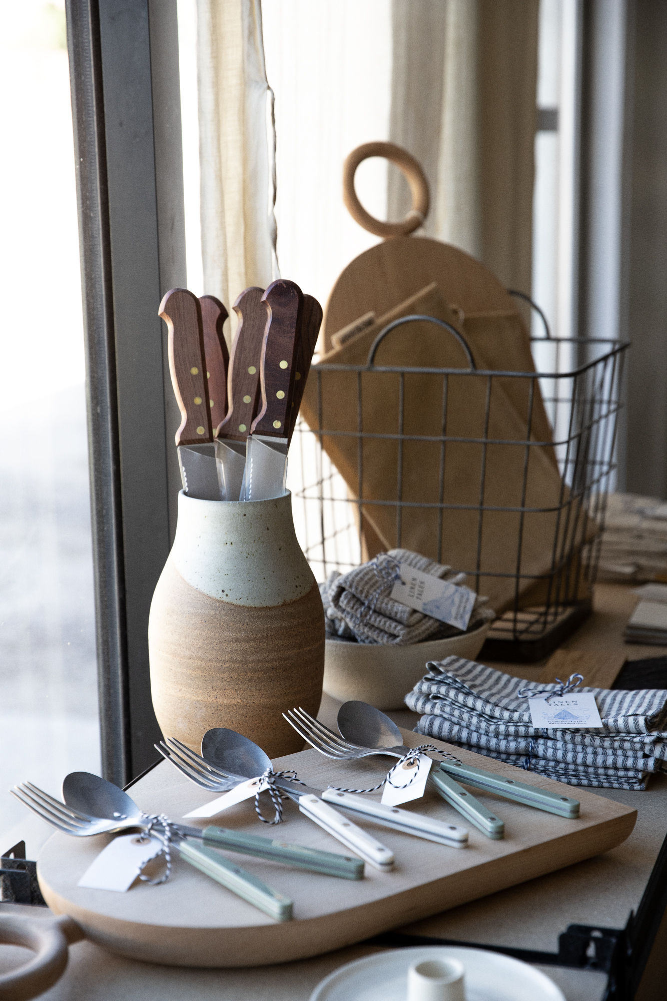 bread shop offers a few simple, well made bread  and dining related items—eac 21