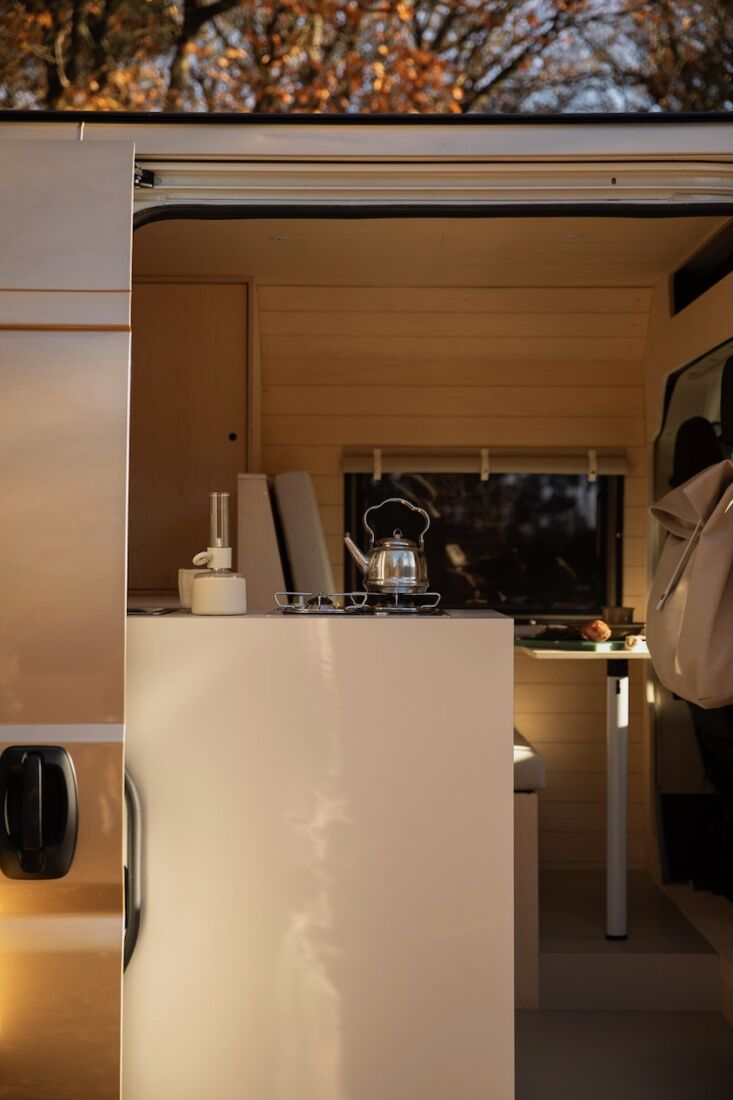 a glimpse of the kitchen. the stainless steel petromax tea kettle is made for c 21