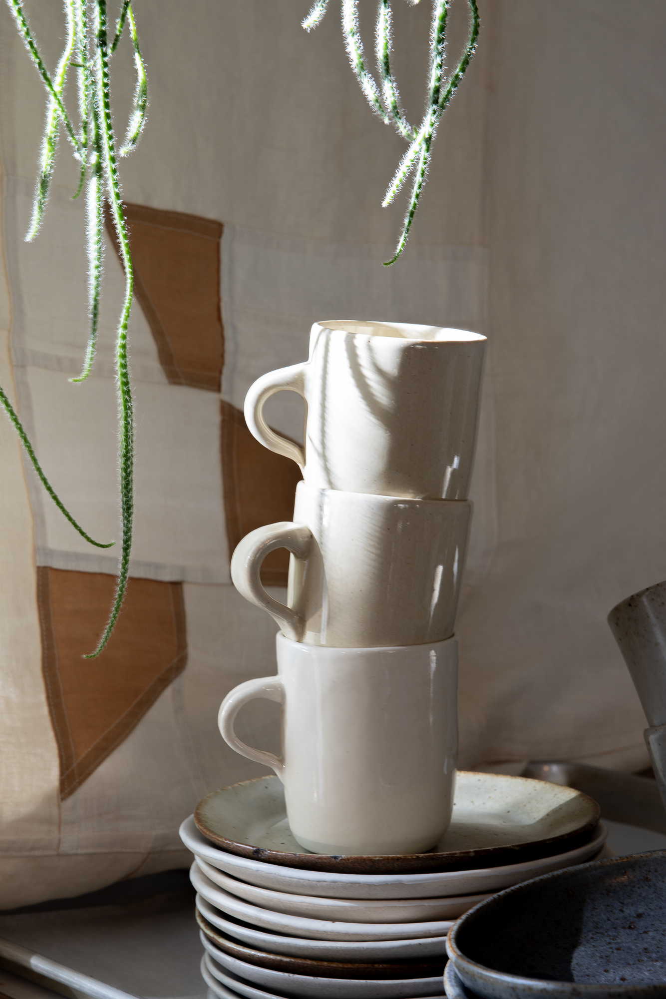 rachel watson\2\17;s mugs and dishes work well colorwise with the pojagi 27