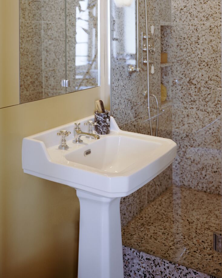 the bathroom walls are painted in jaune de verone t6\24 from argile peinture. a 23