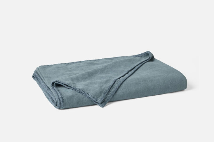 from coyuchi, the helena organic linen blanket is available in river (shown), d 24