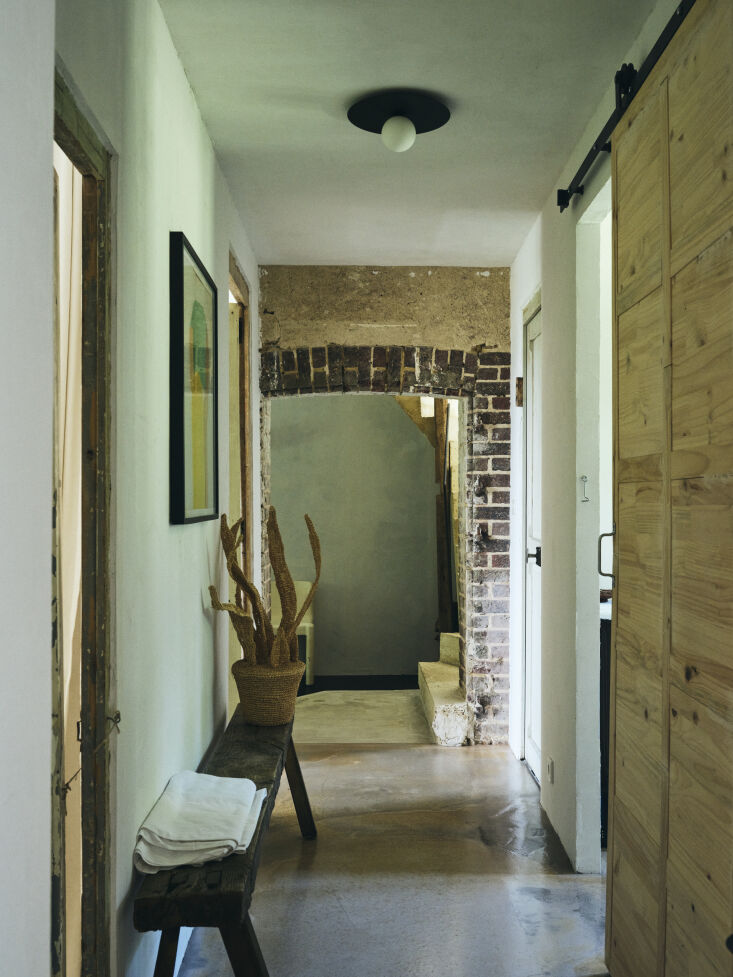 the downstairs corridor leading to the ecurie bedroom, shower room, wc, and liv 27