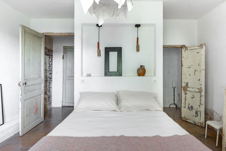 situated on the ground floor, the ecurie room is stripped back, spacious, and s 26