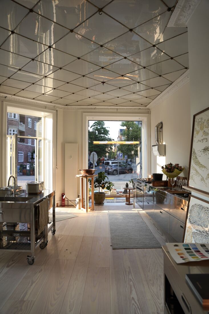 a wider view of the space feels like the kitchen of an artist–which, in a sen 26