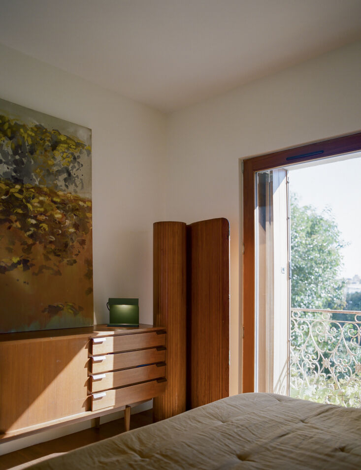 the sideboard is vintage sourced by the owners at a local flea market. the gree 24