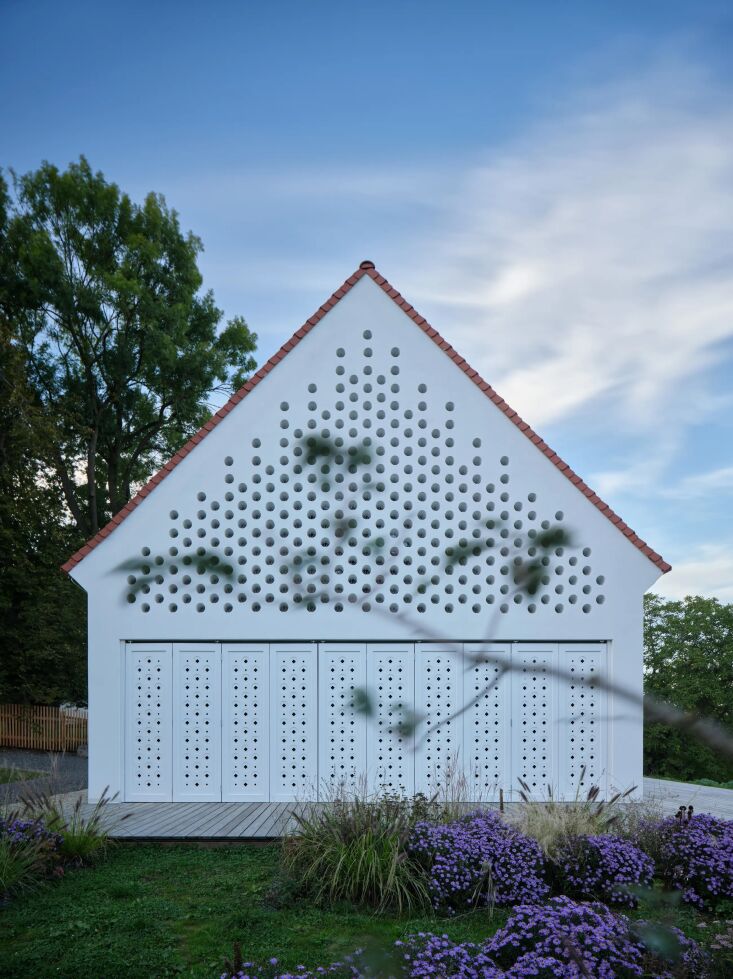 the house can either fully open to the landscape or close off to highlight its  18