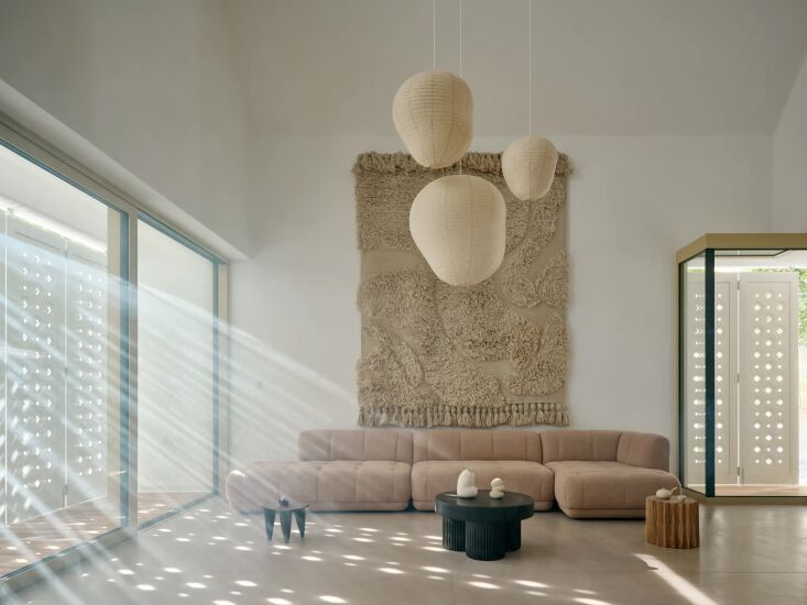 light pouring in to the living room, designed with polished concrete flooring,  21