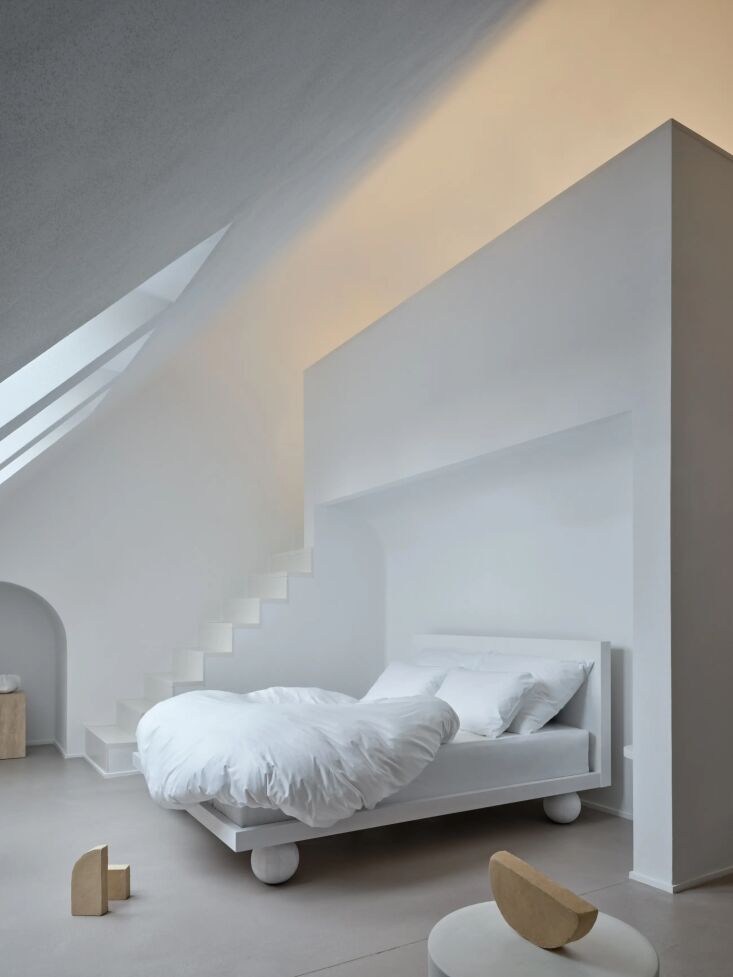 above: custom wooden furniture and sculptures throughout the home were designed 25